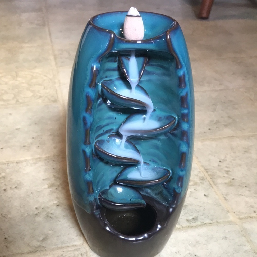 Incense cascading smoke “waterfall”